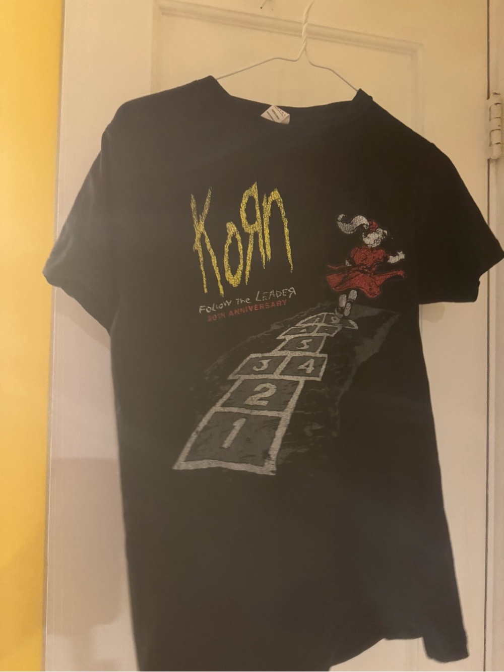 Womans Black Graphic Tee - Follow the Leader Design rock and roll music